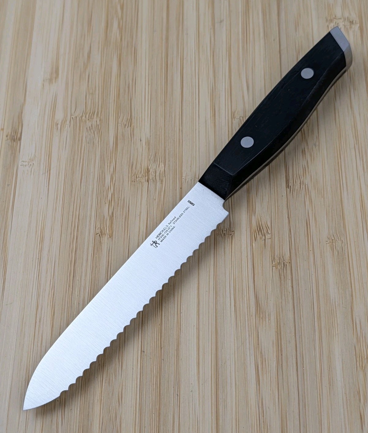 Henckels REFINED 5-in Serrated UTILITY Knife, Stainless Steel, BLACK, 17310-130