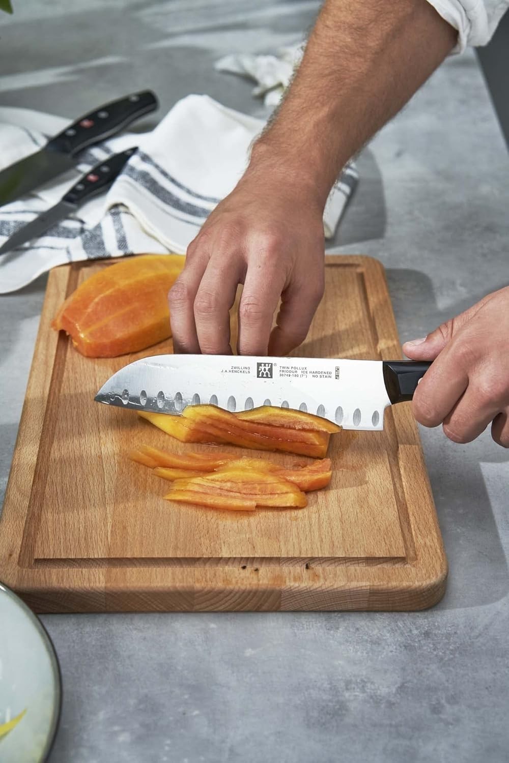 Twin Signature 7-inch Razor-Sharp German Hollow Edge Santoku Knife, Made in C…