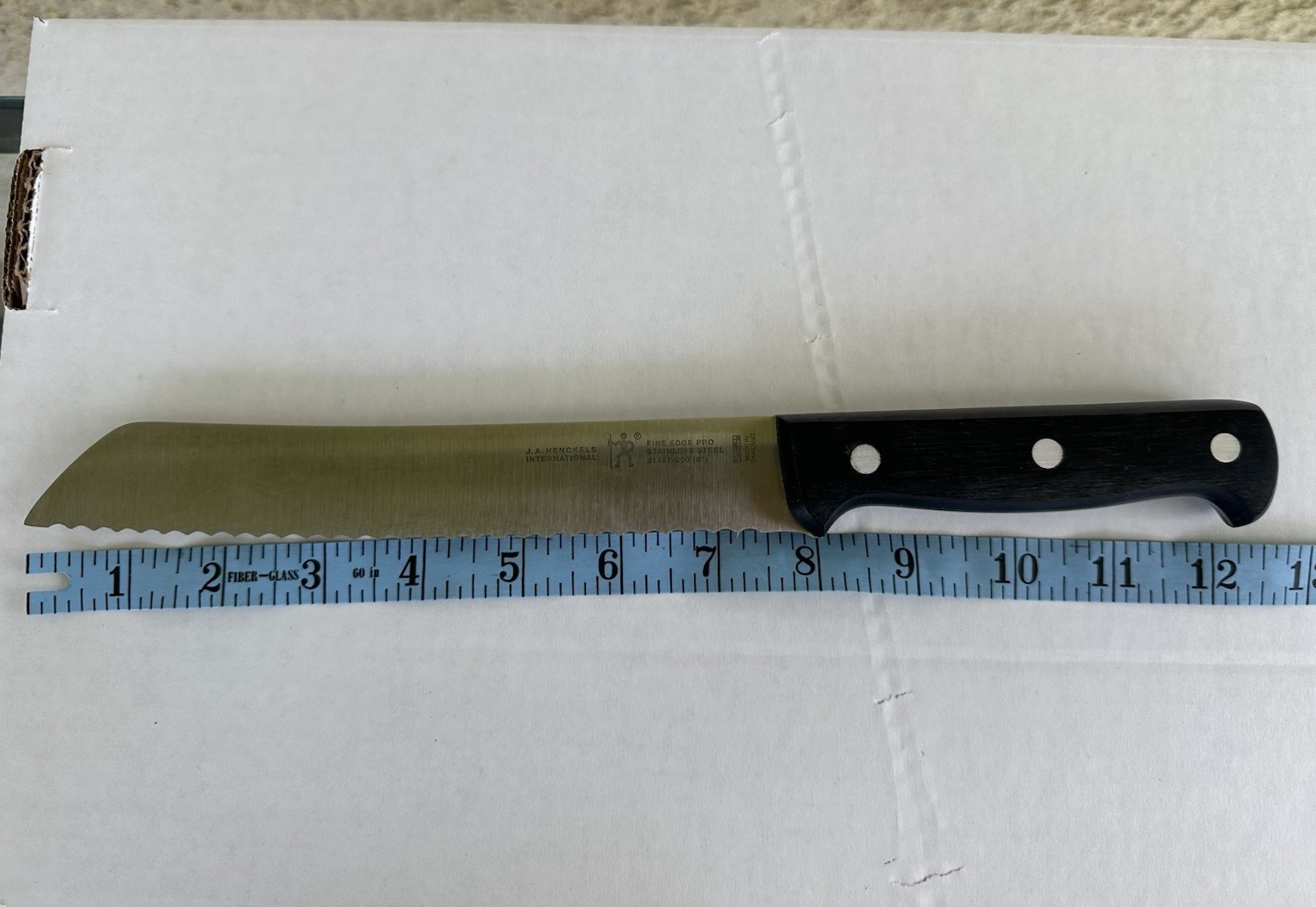 J.A. Henckels International Fine Edge Pro 31467-200 8″ Serrated Bread Knife