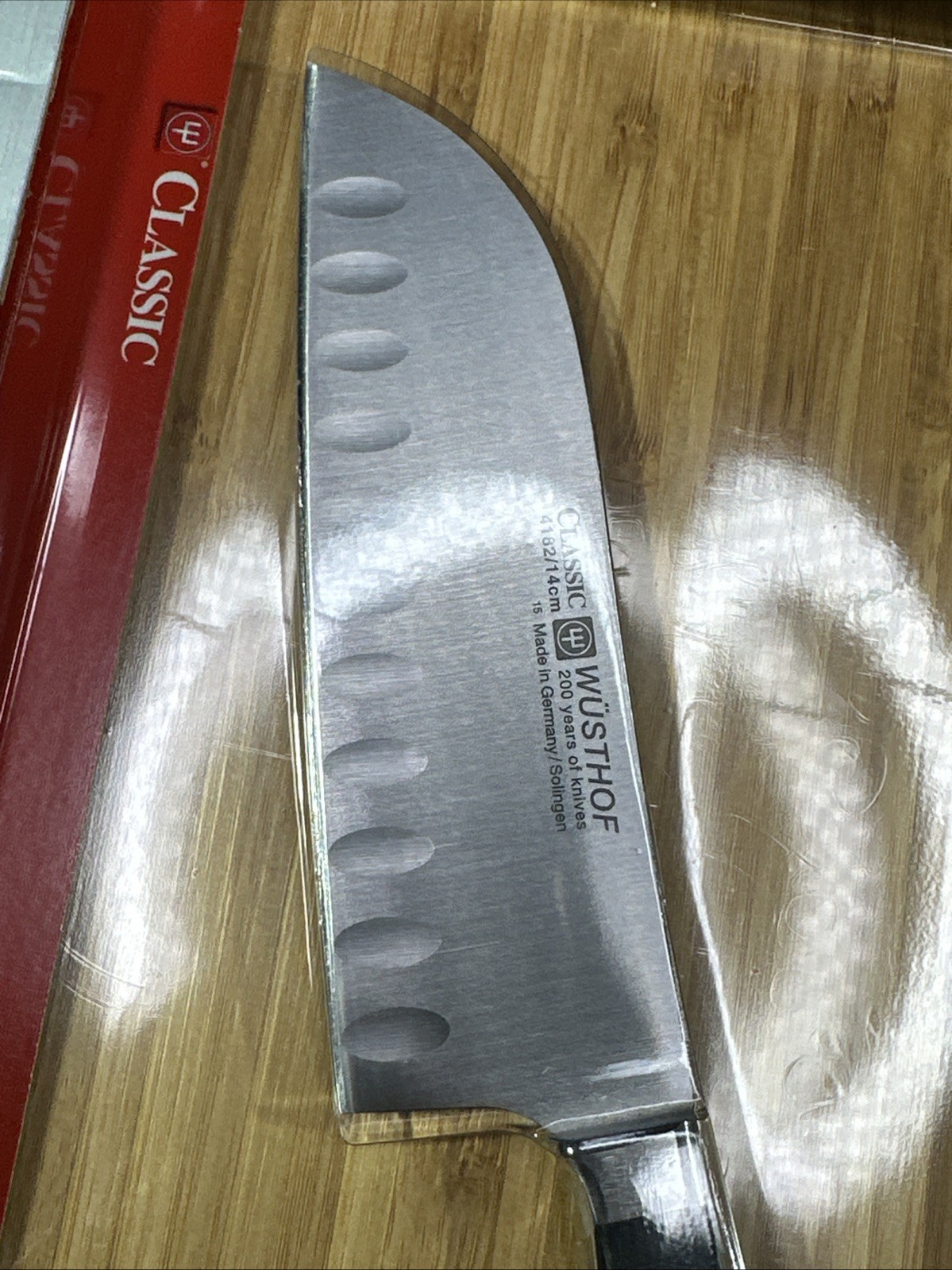 Wusthof Classic Cook’s Knife with Bamboo Cutting Board 4182/14cm