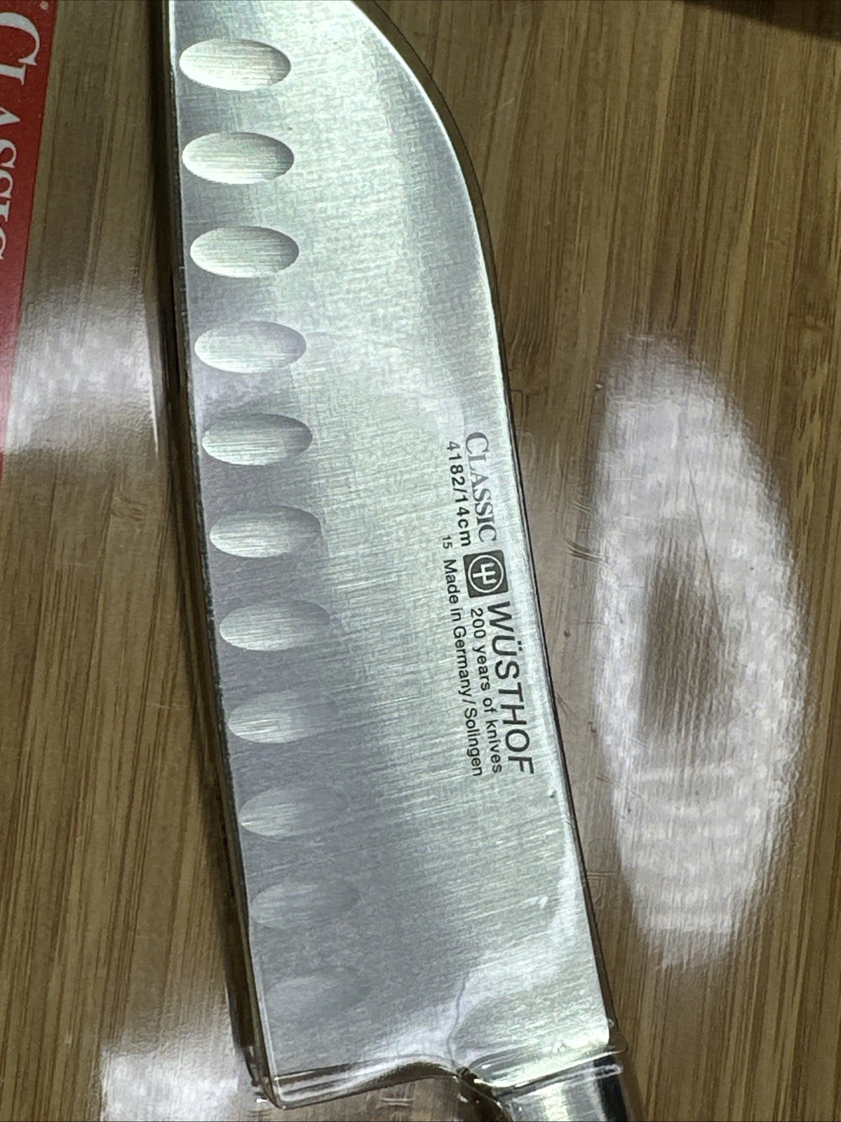 Wusthof Classic Cook’s Knife with Bamboo Cutting Board 4182/14cm