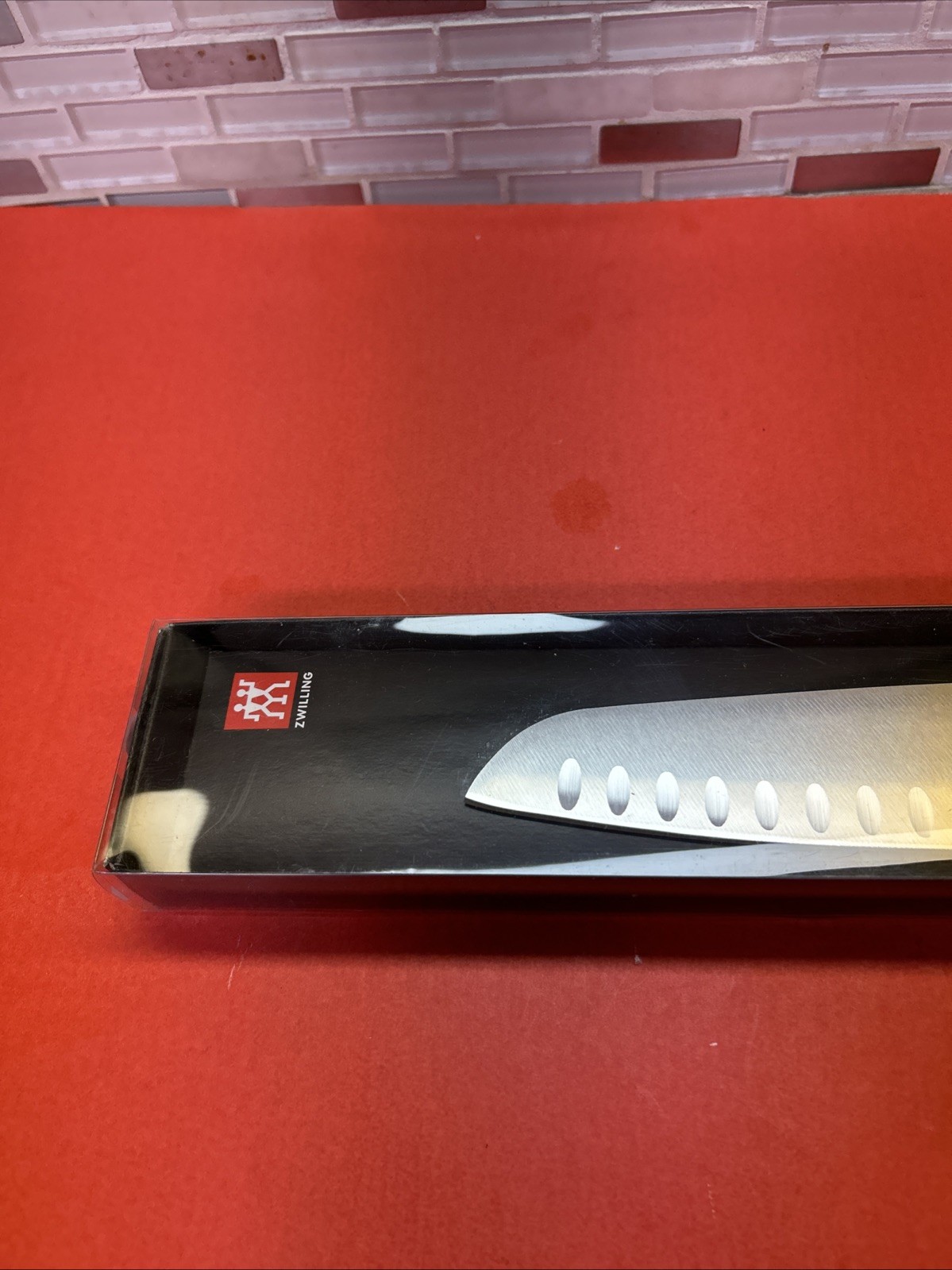 ZWILLING Pro 7-inch Hollow Edge Santoku Knife