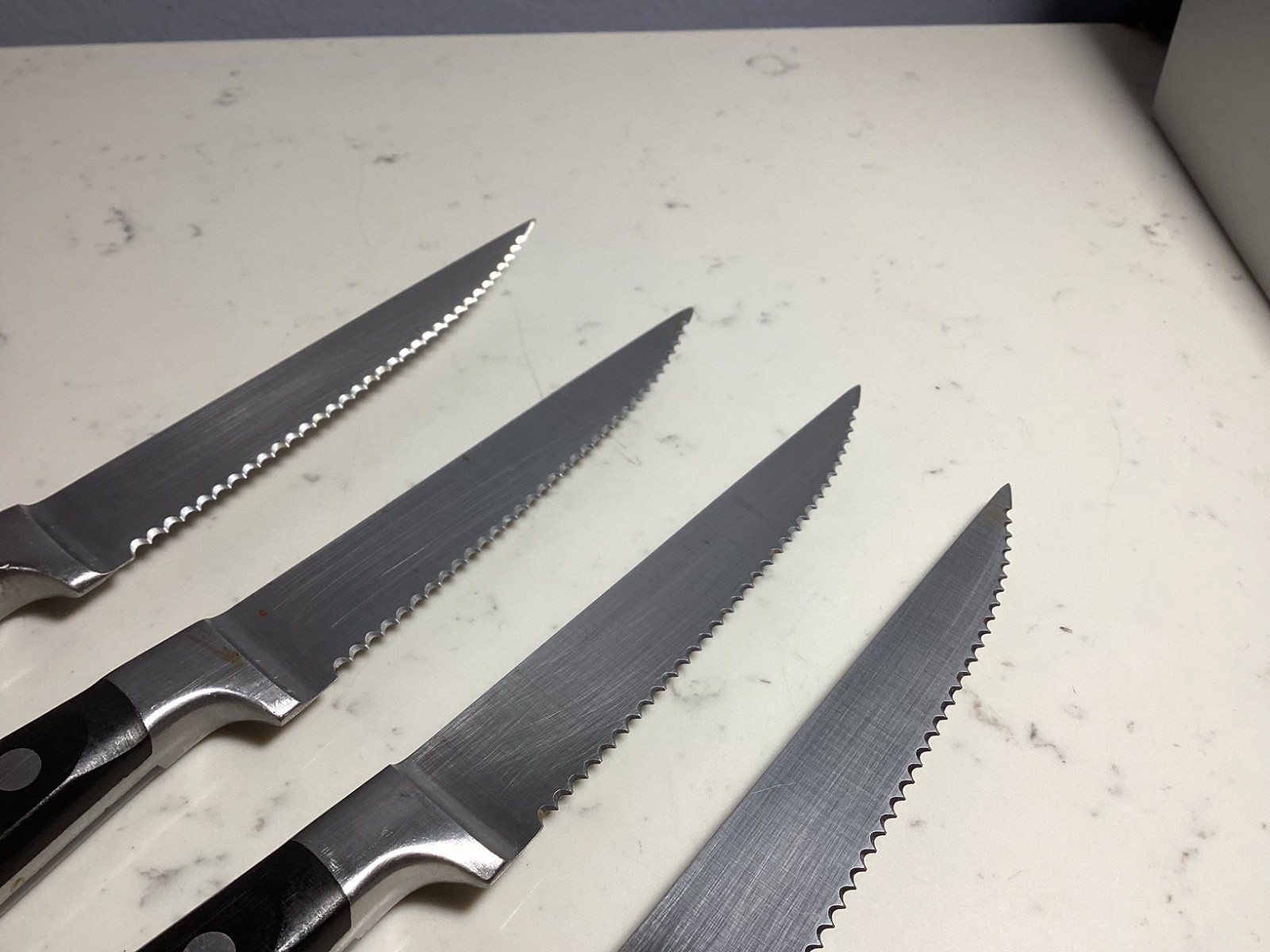 SET OF (4) AUTHENTIC BRANDANI BLACK HANDLE SERATED STEAK KNIFES MUST SEE NR