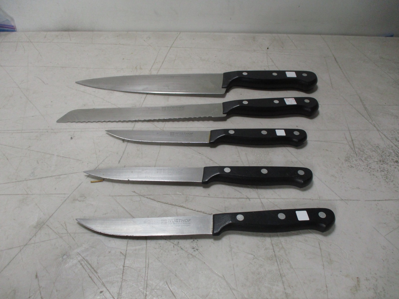 L161) Set Of 5 Wusthof Gourmet Knives 3 Steak. 8″ Chef & 8″ Serrated Bread Knife