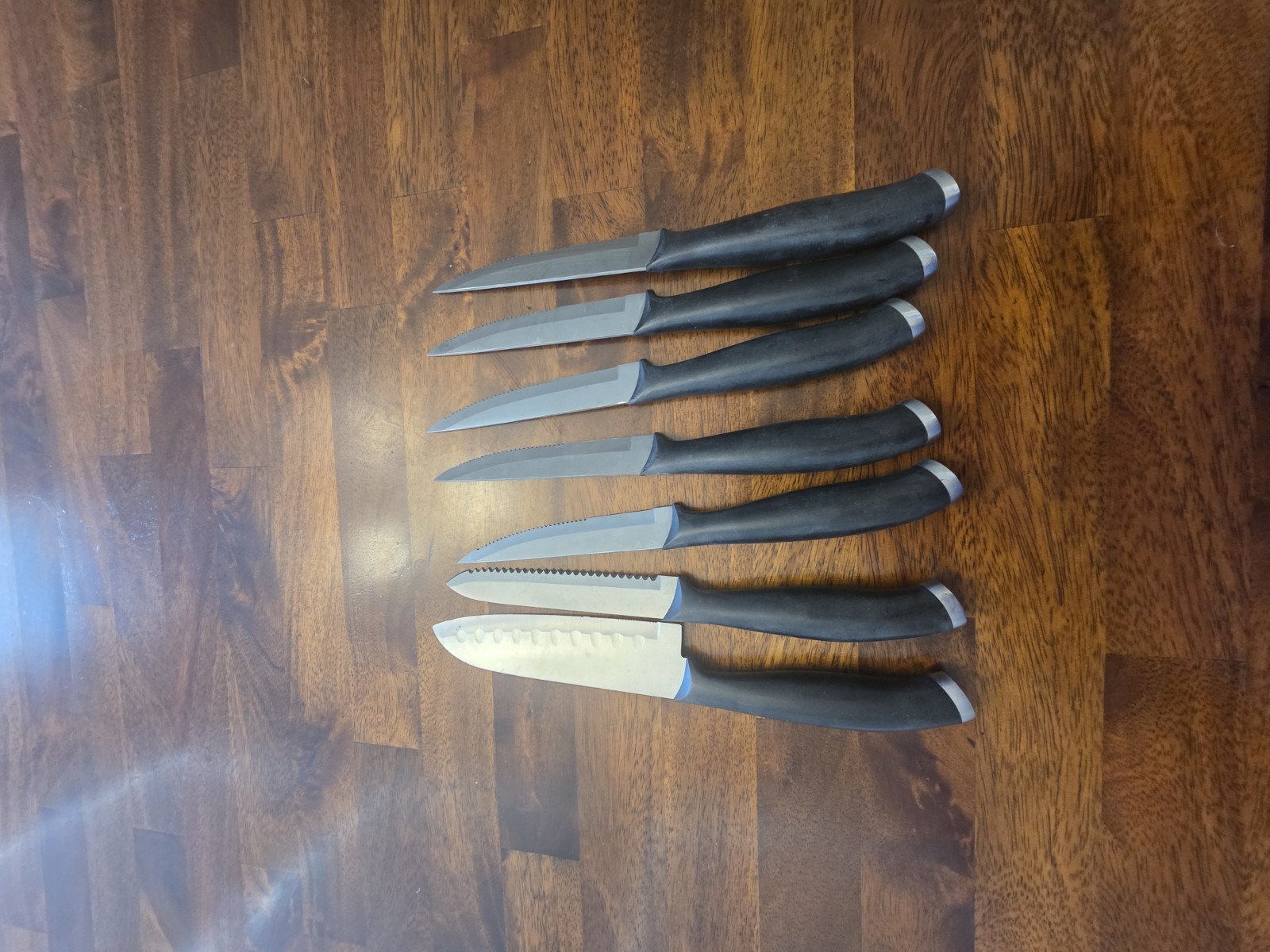 SET OF 7 J. A. HENCKLES STEAK KNIFES