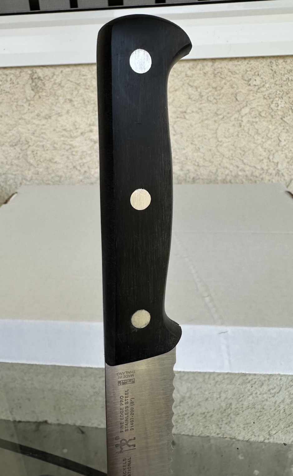 J.A. Henckels International Fine Edge Pro 31467-200 8″ Serrated Bread Knife