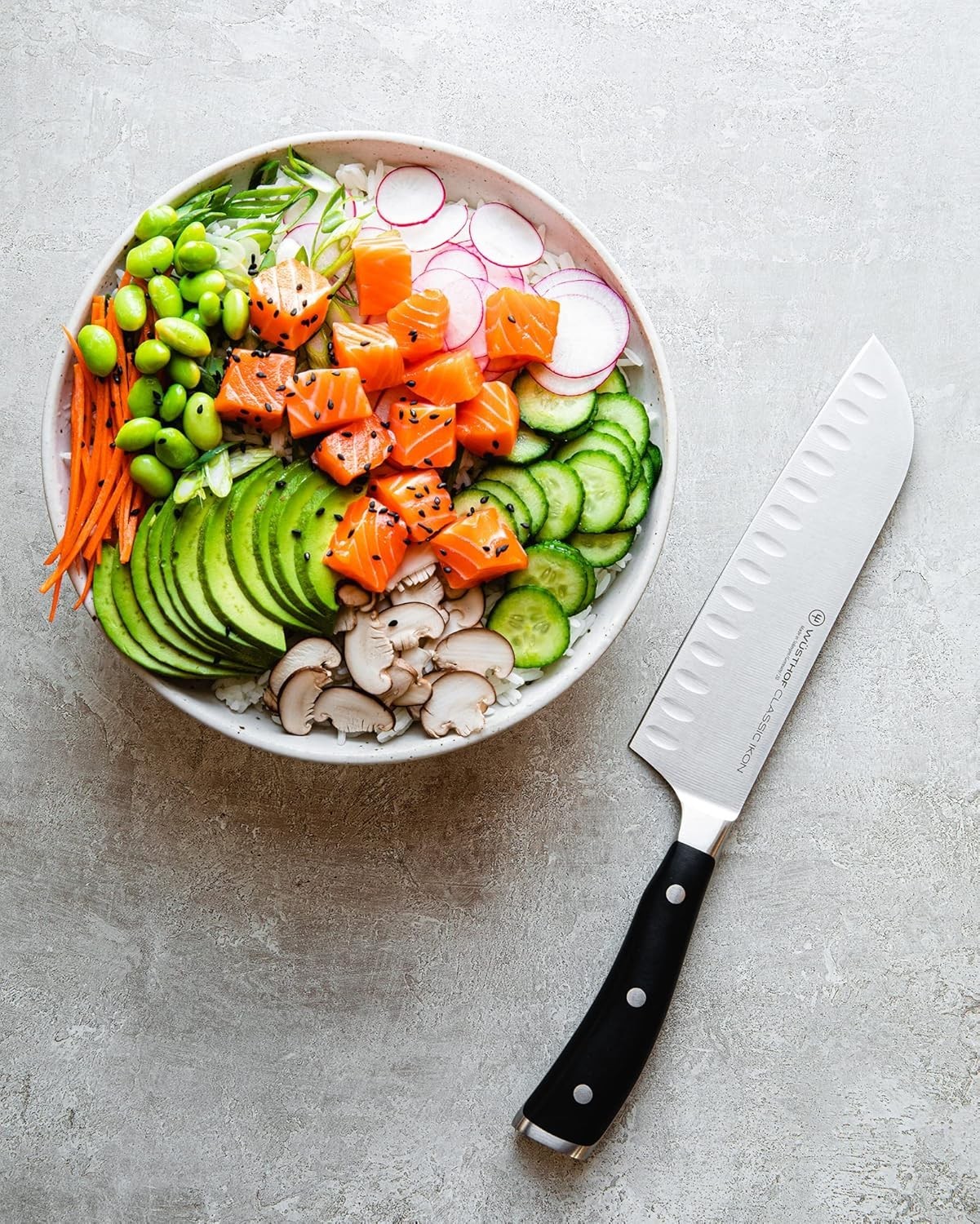Sleek 7-Inch Classic Ikon Santoku Knife with Precision Edge and Black Handle