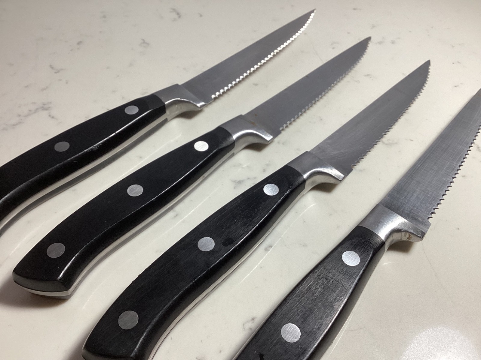 SET OF (4) AUTHENTIC BRANDANI BLACK HANDLE SERATED STEAK KNIFES MUST SEE NR