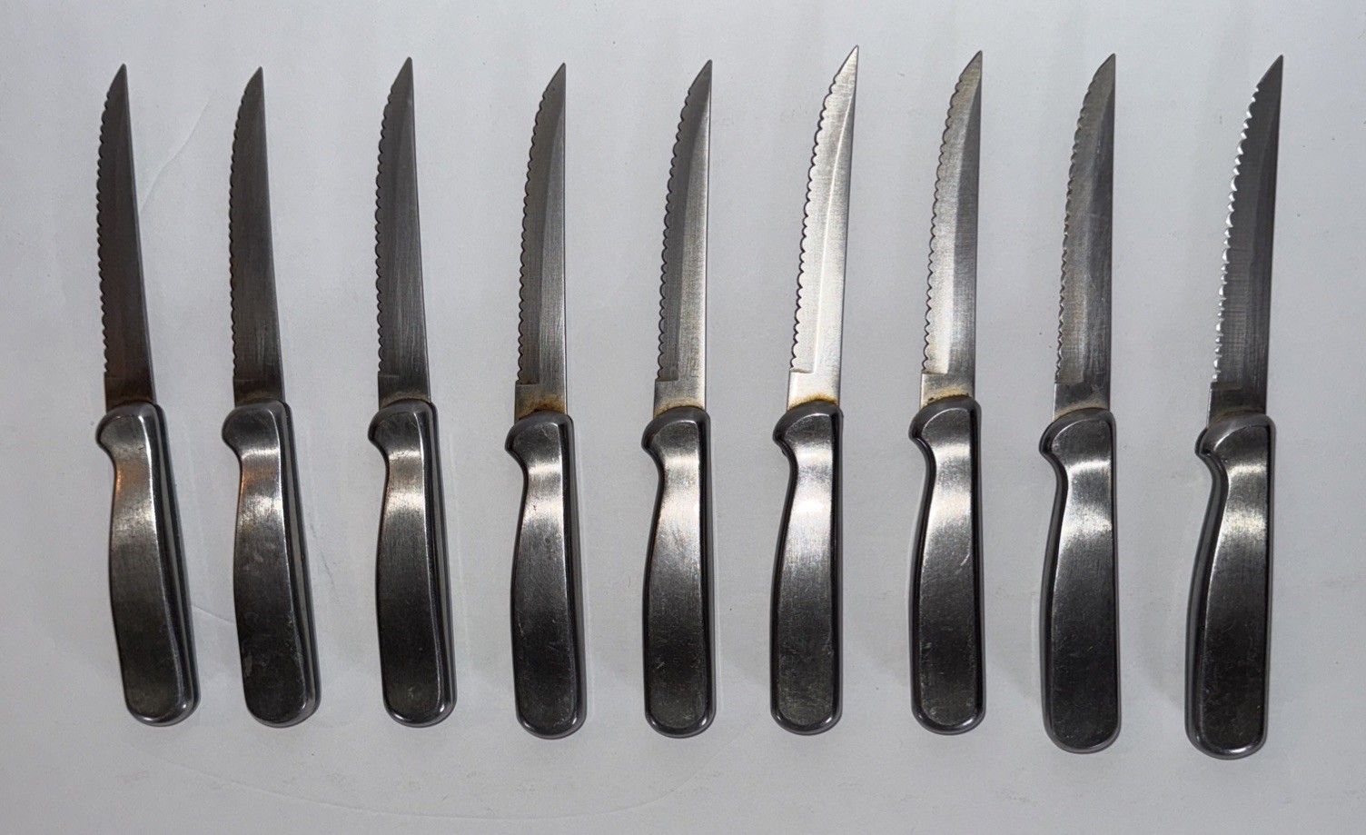 9 Ginsu Heavy Handled Stainless Steel Steak Knives Silver & Black Serrated 8.5”