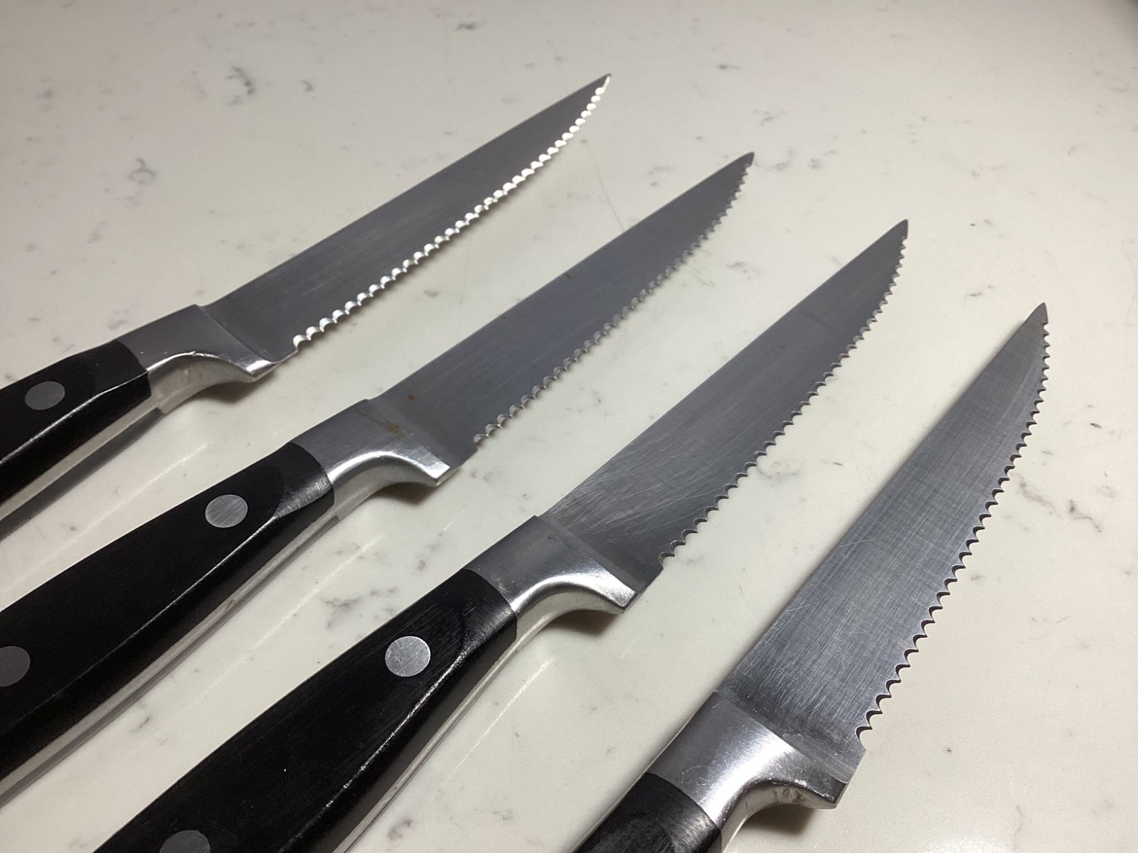 SET OF (4) AUTHENTIC BRANDANI BLACK HANDLE SERATED STEAK KNIFES MUST SEE NR