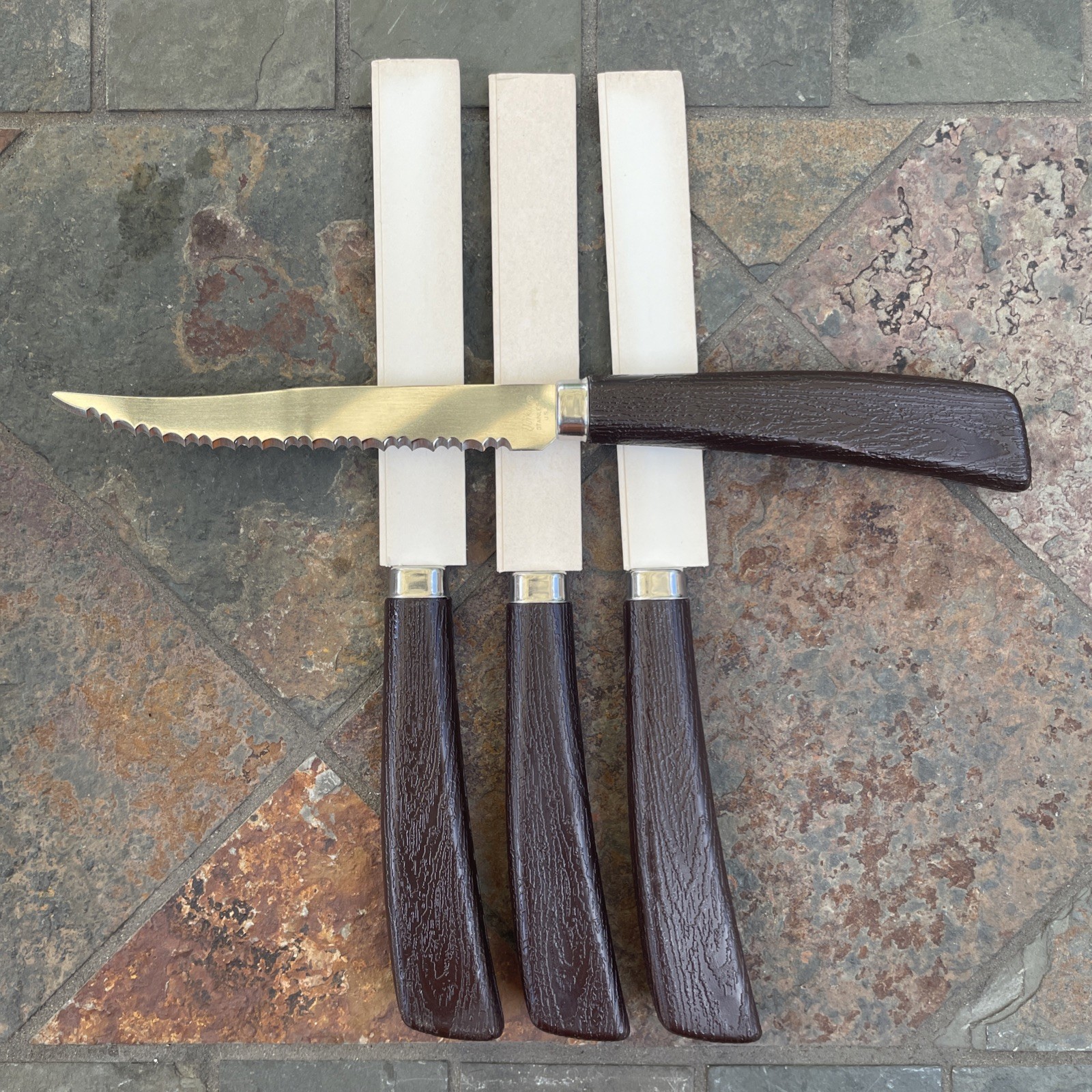 Vintage Quikut Steak Knife Set 4 Piece Serrated Stainless Steel USA Brown Handle
