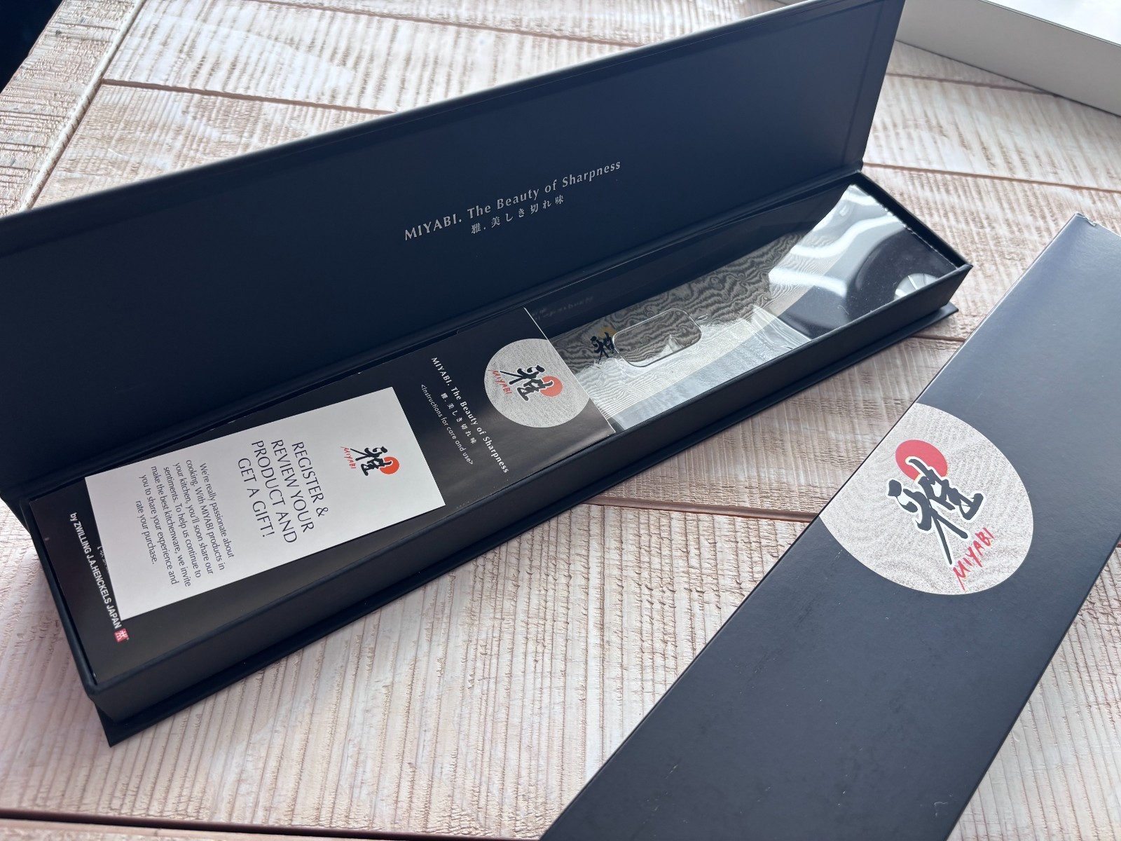 Miyabi Black 7-inch Rocking Santoku, Fine Edge. Open Box. Damascus Blade
