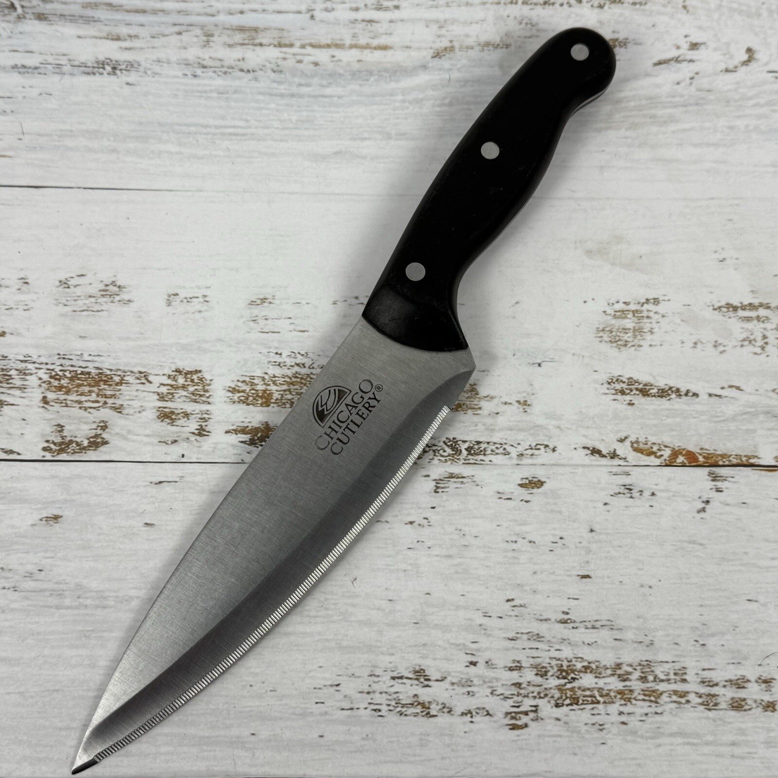 Chicago Cutlery Chefs Knife 7″ Serrated Edge Stainless Blade Black Ebony Handle