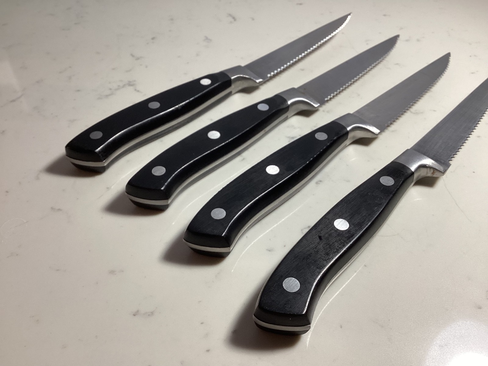 SET OF (4) AUTHENTIC BRANDANI BLACK HANDLE SERATED STEAK KNIFES MUST SEE NR
