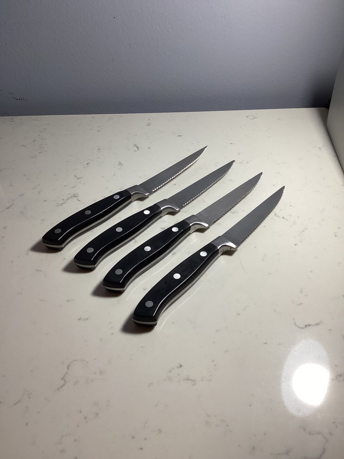 SET OF (4) AUTHENTIC BRANDANI BLACK HANDLE SERATED STEAK KNIFES MUST SEE NR