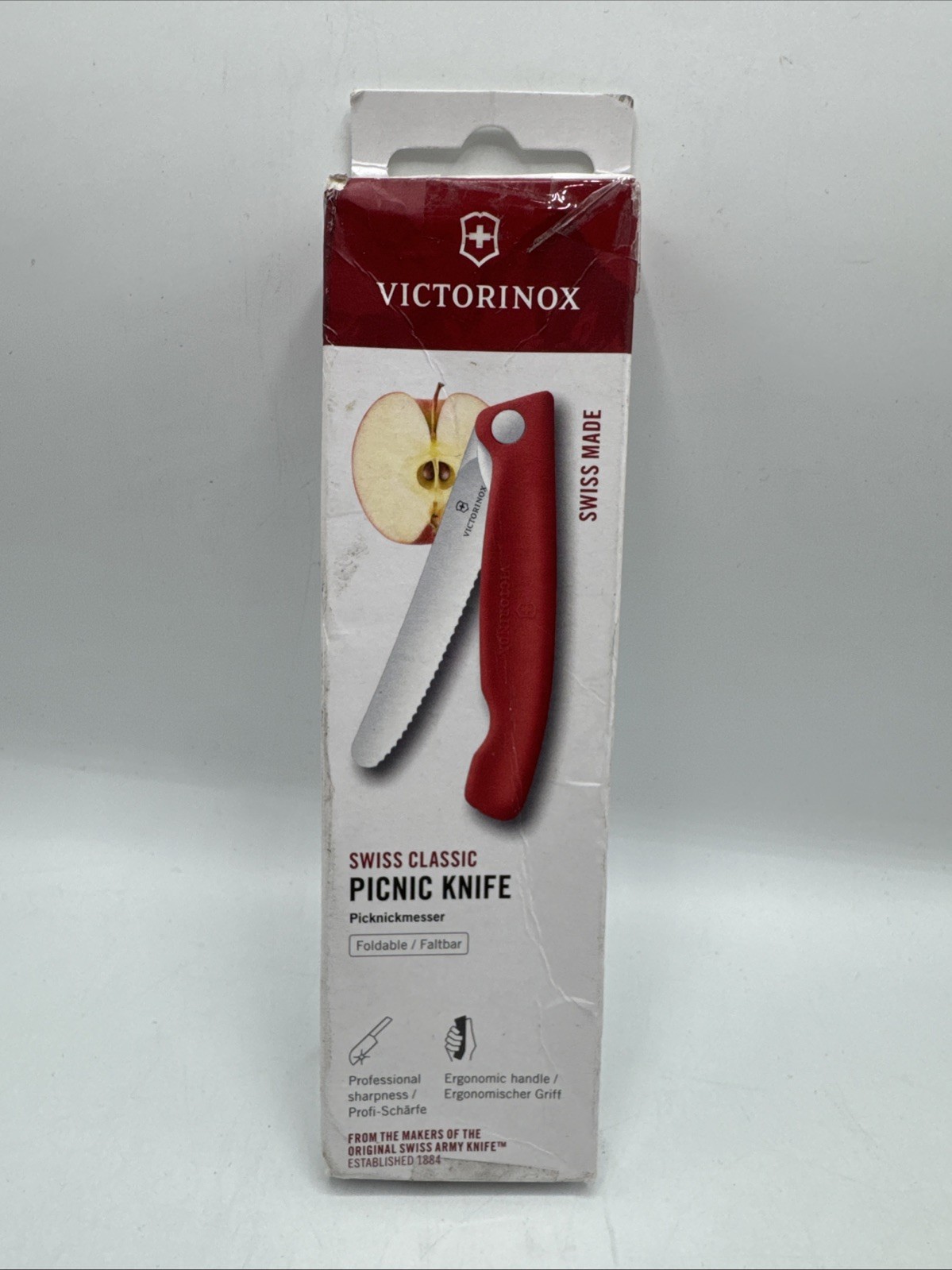 VICTORINOX Swiss Classic Petty Knife 11cm, Dishwasher Safe Folding Serrated Red