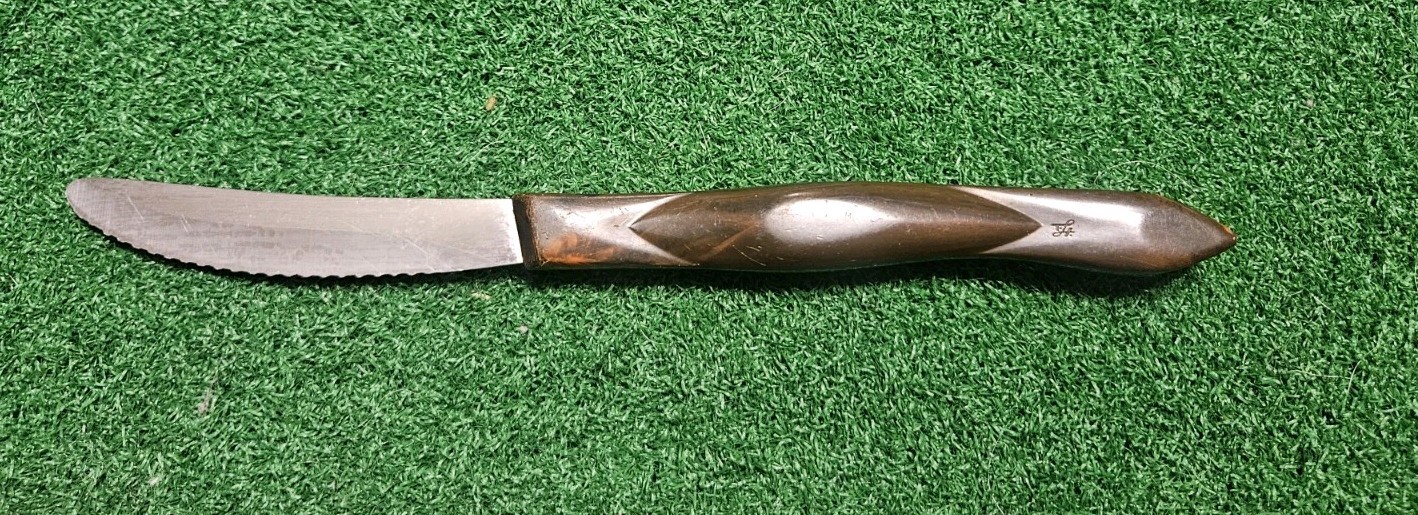 Cutco 1759 Serrated Table Knive Classic Brown Swirl Ergonomic Handle.