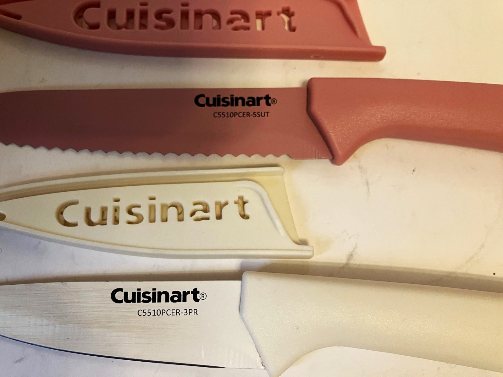 Cuisinart Ceramic Coated Knife Pink 10″ Serrated & Beige 8″ Smooth Edge Set of 2
